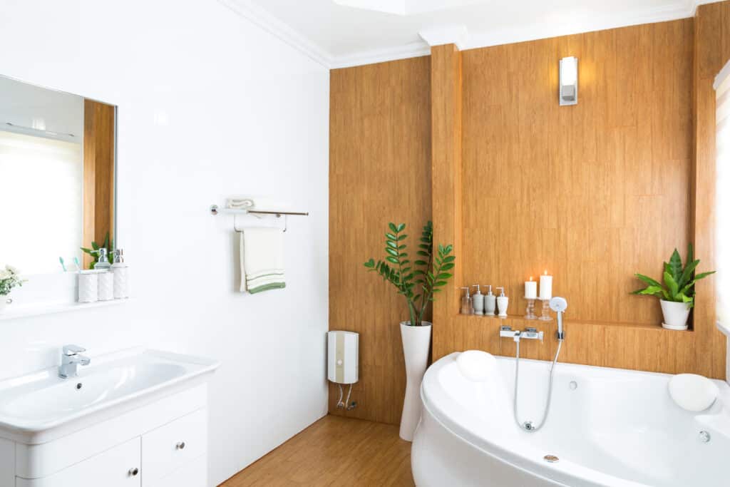 Eco-friendly bathroom design with bamboo flooring and recycled glass surfaces
