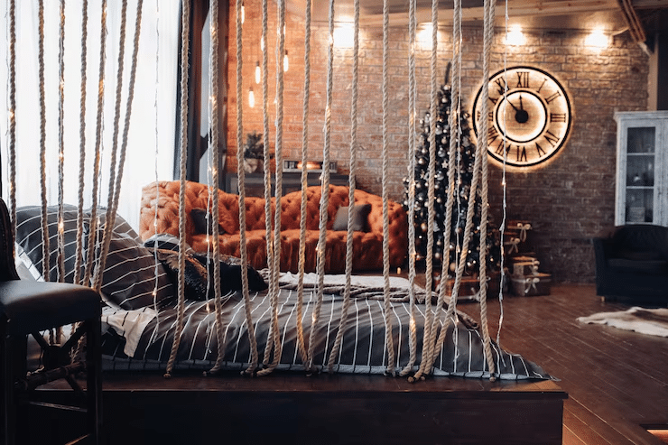 Industrial-style bedroom with exposed brick wall and metal shelving.