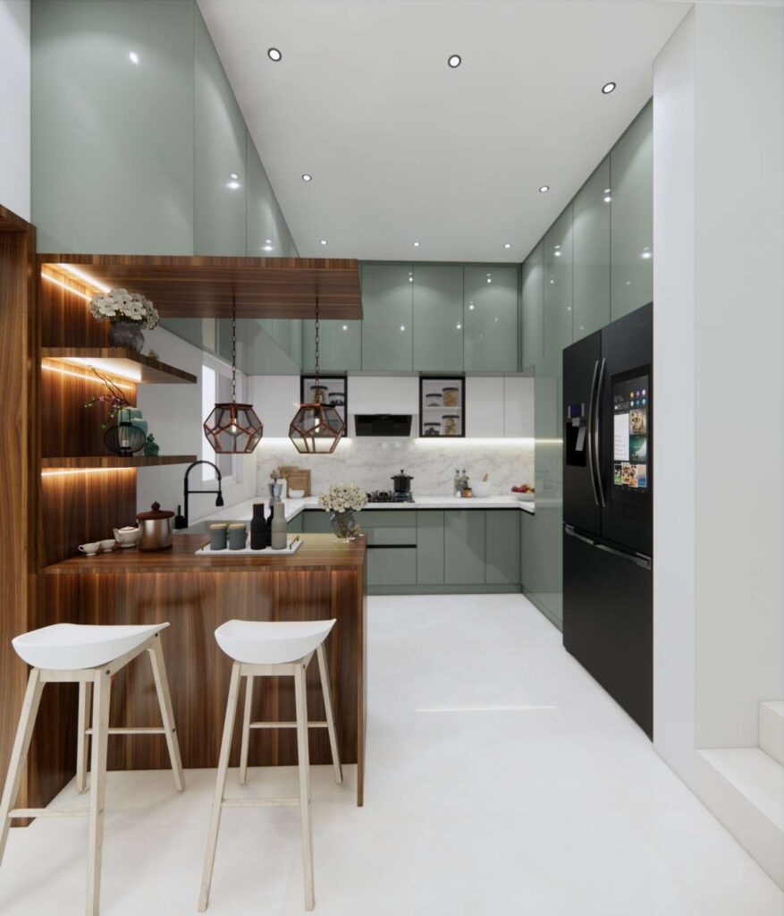 Contemporary modular kitchen design in Jayanagar villa with sage green cabinets, wooden breakfast counter, and pendant lighting by Elegante Interiors