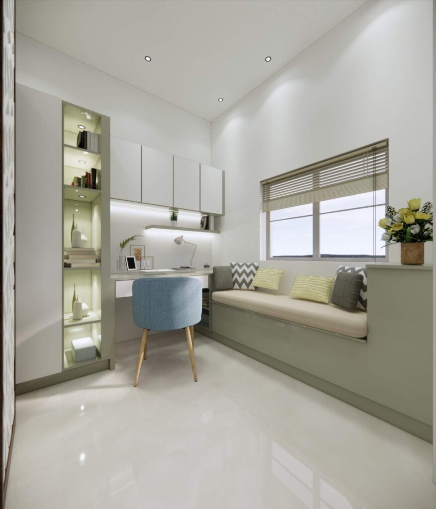 Modern home office interior design with sage green built-in storage, compact desk, window seating, and natural lighting in Jayanagar villa