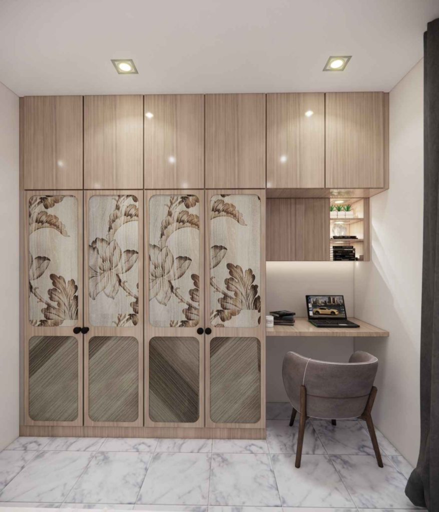 Efficient home study area with built-in cabinets, wooden desk, and comfortable chair designed for productivity by Elegante Interiors