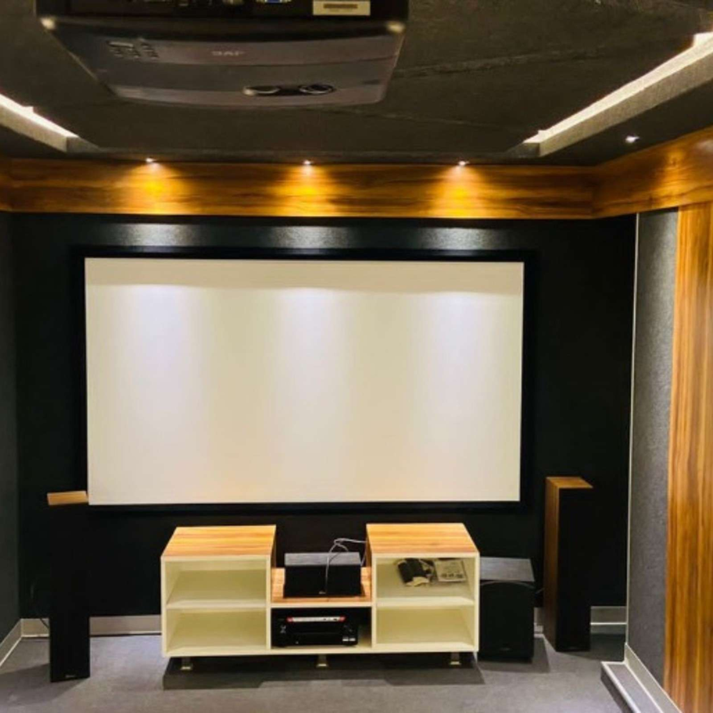 Premium home theater interior design with custom wooden acoustic panels - Elegante Interiors