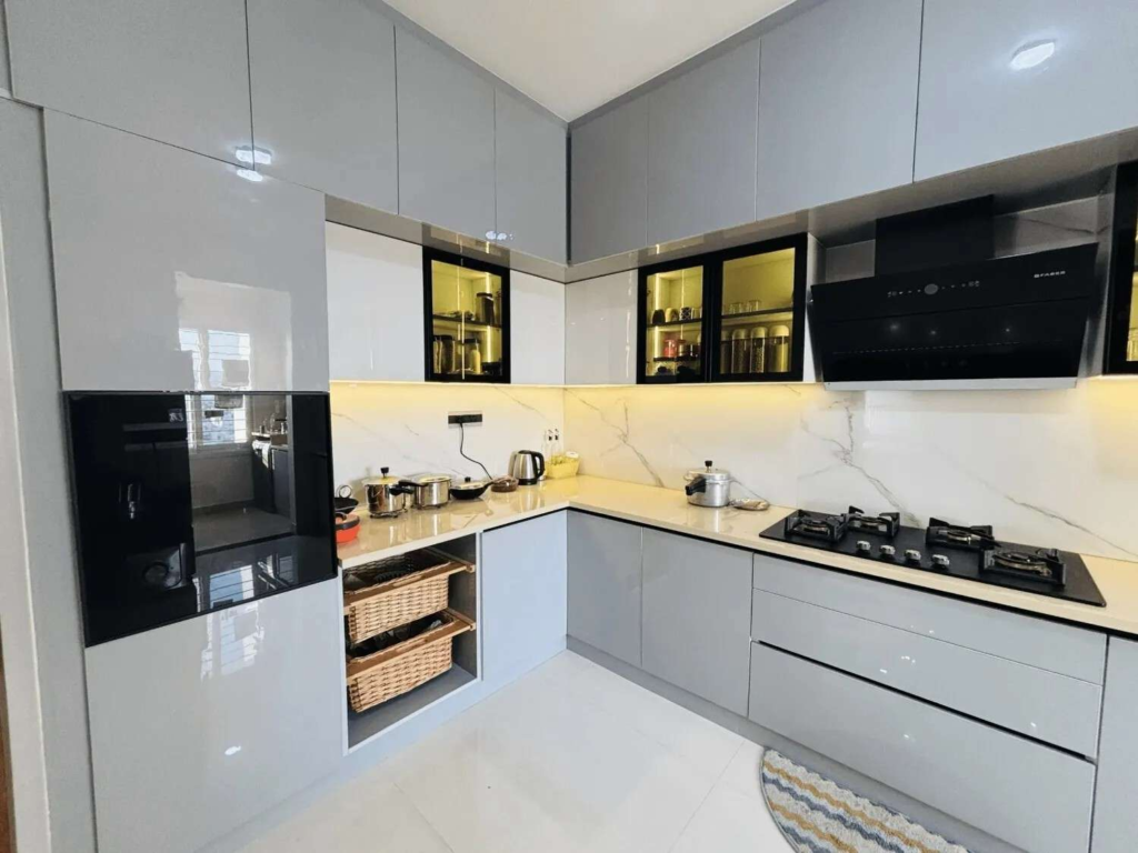 Contemporary modular kitchen design with grey cabinets stone countertops and integrated lighting solutions